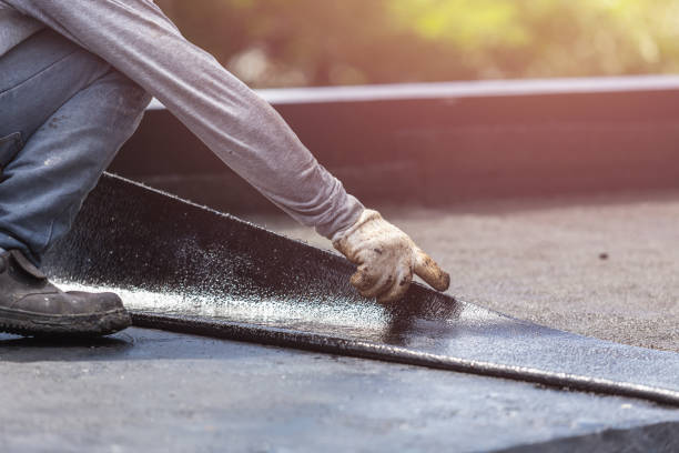 Professional Basement Waterproofing technician working in Bowmansville, NY